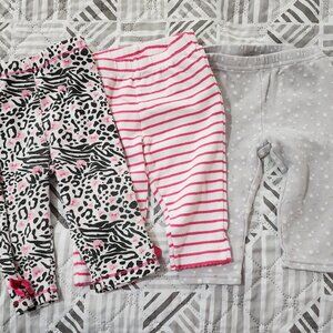 Various Brands, 3 pants, up to 6 MO size.